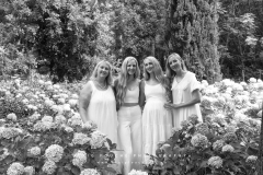 Black and white portrait of family interacting naturally outdoors CFP1039-1M