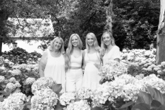 Black and white portrait of family interacting naturally outdoors CFP1041-1M