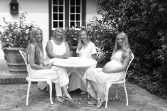 Black and white candid moment between mother and daughters CFP1053-1M