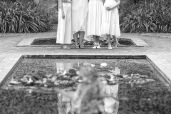 Black and white natural portrait of family bond between mother and daughters CFP1068-1M