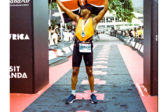 Runner approaching finish line at Ironman Rwanda 70.3