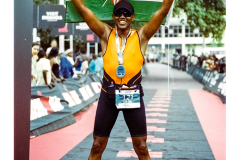 Runner approaching finish line at Ironman Rwanda 70.3