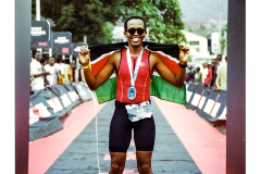 Kenyan runner at the finish line at Ironman Rwanda 70.3