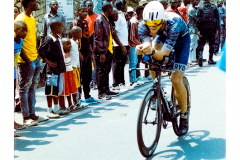 Cyclist riding along Lake Kivu during Ironman Rwanda 70.3