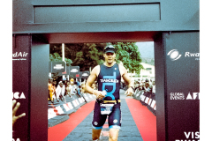 Runner approaching finish line at Ironman Rwanda 70.3