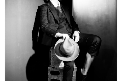 Studio portrait with shadow and contrast lighting