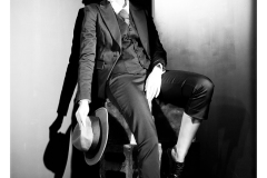 Studio portrait with directional lighting and shadows