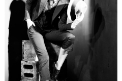 Artistic studio portrait with high contrast lighting
