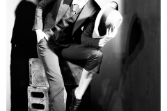 Dramatic black and white portrait with hat styling