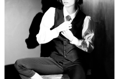 Editorial portrait with strong pose and styling