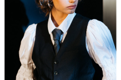 Androgynous fashion portrait of Mila Engelbrecht in studio by Craig Fouché